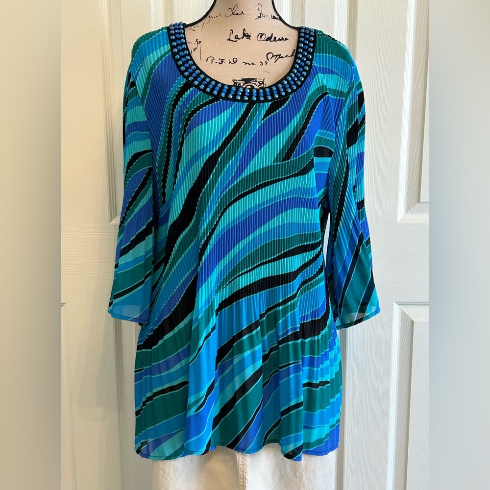 Catherine’s women’s blue pleated pullover blouse
1X
